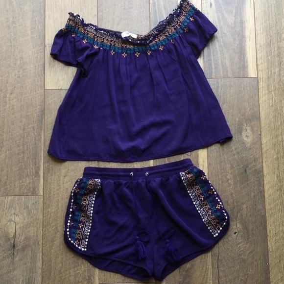 Tops - Blue shirt and shorts set.